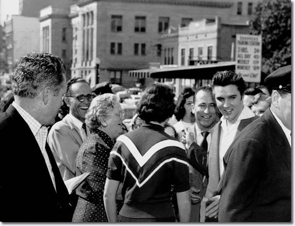 Elvis Presley swapped pleasantries with well-wishers after being cleared : October 19, 1956.