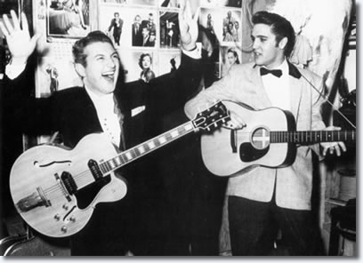 Liberace hams it up with Elvis backstage at The New Frontier