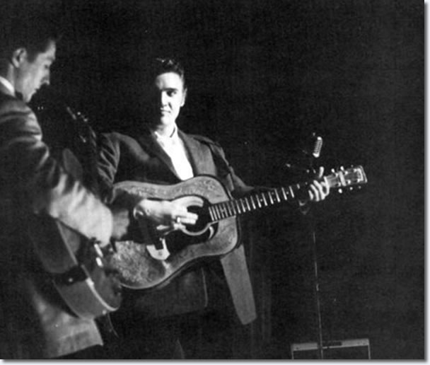 Scotty Moore and Elvis on stage.
