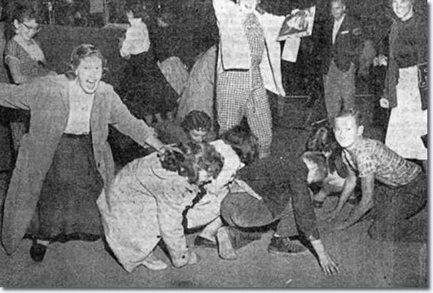 Elvis fans scoop dirt where Elvis sang at Multnomah Park - Sept. 2, 1957