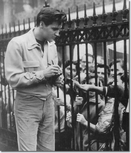 Elvis signing autographs on location King Creole. 2/3/5 or thursday 6th of January 1958