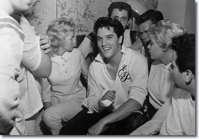 Elvis breaks his finger playing touch football at Graceland, Elvis visits a hospital and goes home after spending one night, declaring 'I Don't Have Any Business in a Hospital'