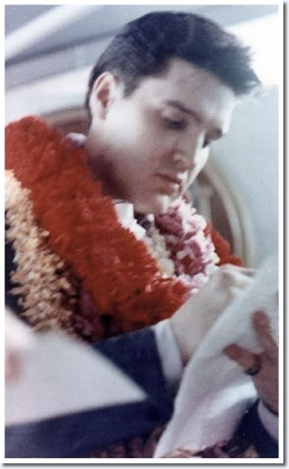 Elvis Presley : March 25, 1961 : Arriving at Honolulu Airport for that evenings U.S.S. Arizona Benefit Concert.