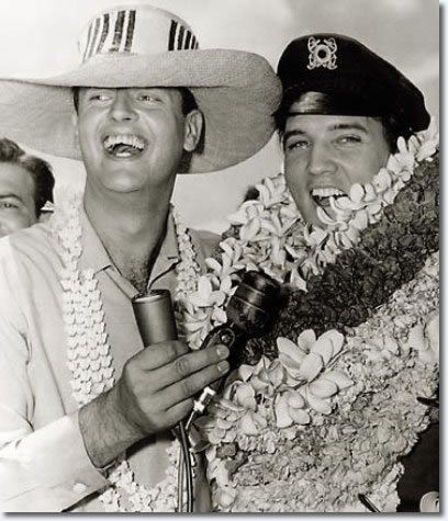 KPOI-AM DJ Tom Moffatt and Elvis presley : Saturday, April 7, 1962. Arriving at Honolulu Airport for location filming in Hawaii for Paramount's Girls! Girls! Girls!