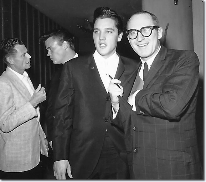 Elvis Presley with Las Vegas Entertainment Columnist Forest Duke at the opening of Johnny Ray's show at the Dunes Hotel. Sonny West is behind them.