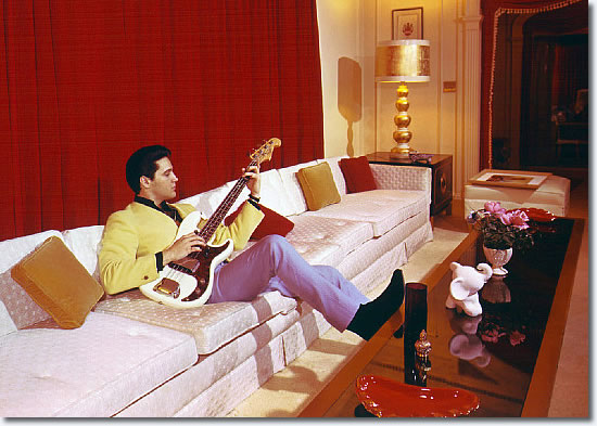 Elvis Presley Graceland March 1965 Elvis Presley fiddles with an electric