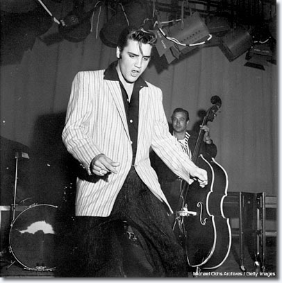 June 1956: There was a photographer for the teen magazines named Earl Leaf, and Earl mostly shot movie stars. The only two '50s rock 'n' roll sessions he's done were for Ricky Nelson, and he got to photograph Elvis at this 'Milton Berle Show' rehearsal. I think Earl Leaf's shots are just as good as Alfred Wertheimer's. You can see the complete intensity -- just riveting.