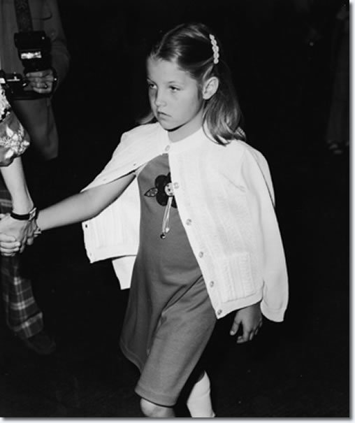 A nine year old Lisa Marie doesn't look too happy in this photo. Her parents Elvis and Priscilla had divorced roughly four years earlier. Though Priscilla took most of the responsibility in raising their daughter, Lisa Marie did spend a lot of time at Graceland with her father. Here she attended the first ever "Children's Premiere" benefit for the Thalians Community Mental Health Center at Cedars Cinai Medical Center in Los Angeles in March 1977, just months before her father would die in front of her on the bathroom floor.