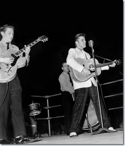 Scotty, Bill and Elvis onstage (in the ring) at Ellis Auditorium : Dec 19, 1955