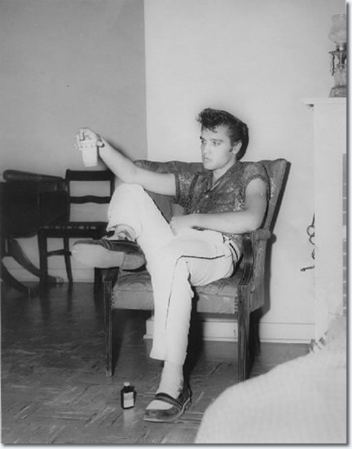 Elvis Presley in the Manager's house at the Drive-In - July 15, 1955.