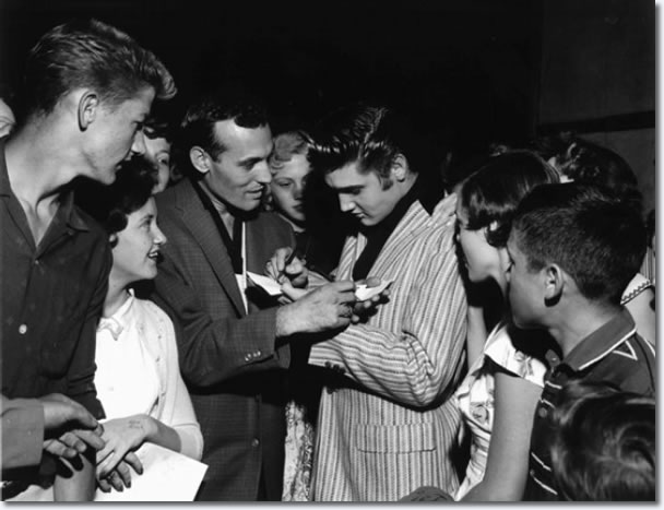 Carl Perkins and Elvis Presley swap autographs, Overton Park Shell, Memphis June 1, 1956
