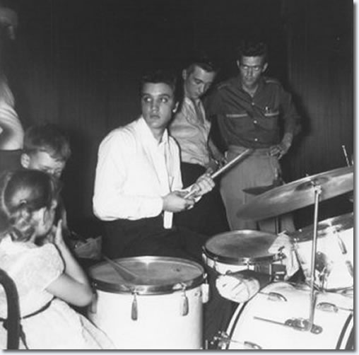 Elvis back at the drums in between shows at the Mosque - June 30, 1956