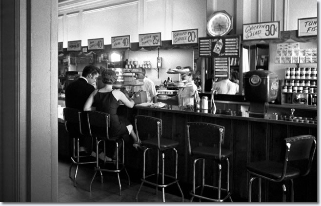 Wertheimer's photographs of Elvis in Richmond taken on June 30 are amazing. His picture (Above) of Elvis with a young woman he had just met, sitting at the Jefferson Hotel lunch counter, called Grilled Cheese 20 cents is a classic look at 1950s America. 
