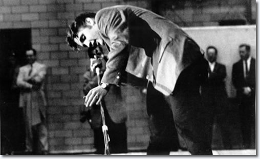 Elvis performing during first show in the fieldhouse - May 27, 1956