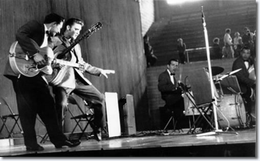 Scotty Moore, Elvis Presley, DJ Fontana and Bill Black perform during first show in the fieldhouse - May 27, 1956