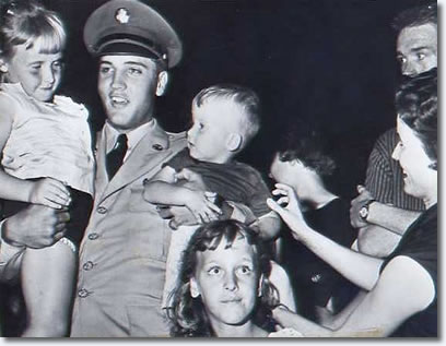 Elvis holding Donna Harrison aged 5 and Ronnie Brown aged 2, June 1st 1958