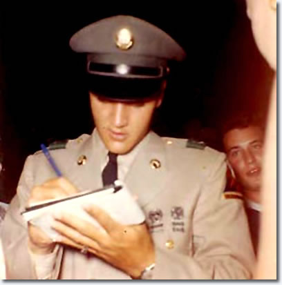 Elvis Signing autographs outside Graceland June 1st 1958.