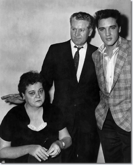 Elvis Presley at the draft board with his parents, Gladys and Vernon Presley in 1958. Elvis reported for Army duty to the Draft Board office in the M &M Building at 198 South Main about 6:30 a.m. March 24, 1958. After undergoing processing and a physical at Kennedy Veterans Hospital, he and other inductees would board a bus for Fort Chaffee, Arkansas later that afternoon. By the 28th, Elvis arrived at Fort Hood, Texas where he would undergo six months training before shipping off to Germany. His mother would die before he completed training.