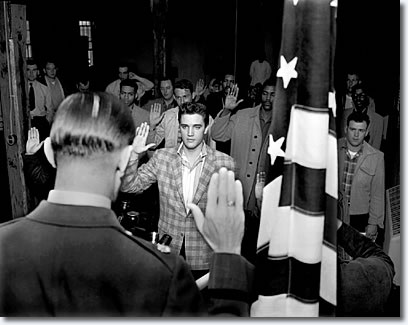 Elvis Presley is sworn in on the day of his induction into the army March 24, 1958. Maj. Elbert P. Turner adminstered the oath.