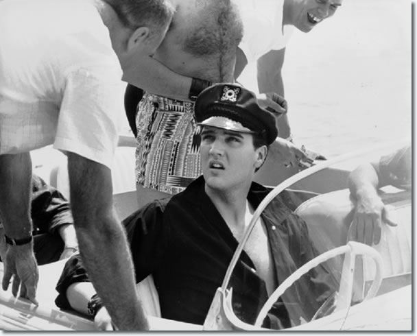 Elvis Presley and several friends took a spin around McKellar Lake in his new boat Friday July 8, 1960.