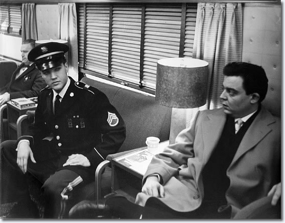 Elvis Presley during the last few miles of the train ride home Monday March 7, 1960