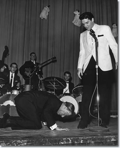 Comedian George Jessel hit the stage in an exaggerated salaam to the King of rock and roll at Elvis' evening performance at Ellis Auditorium Feb. 25, 1961
