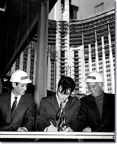 February 26, 1969 - Elvis signing his performance contract with The International Hotel in Las Vegas. 