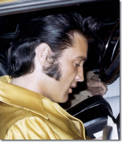 Elvis Presley in the driveway of his Hillcrest home, leaving for a rehearsal at RCA studios in July 1969