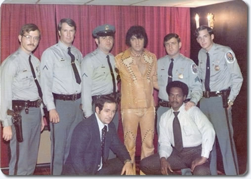 Elvis backstage on September 27/28, 1974 with police officers who were proud to 'pose' with the King. The gentleman below right, is one of Elvis' friends, 'Smokey Joe' Thompson.
