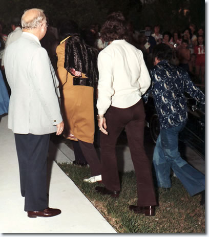 Elvis arriving at Lake Charles in the early morning hours of May 4, 1975 with Jerry Schilling, Joe Esposito and Red West.