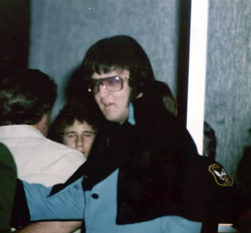 Elvis Presley just after arriving on the Lisa Marie, heading to his hotel shortly after midnight February 20, 1977.