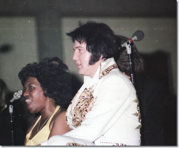 Elvis Presley takes a break during his performance, Macon, GA on June 1, 1977.