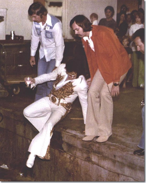 Elvis, heading to perform via the hotel back entrance in Macon, GA on June 1, 1977