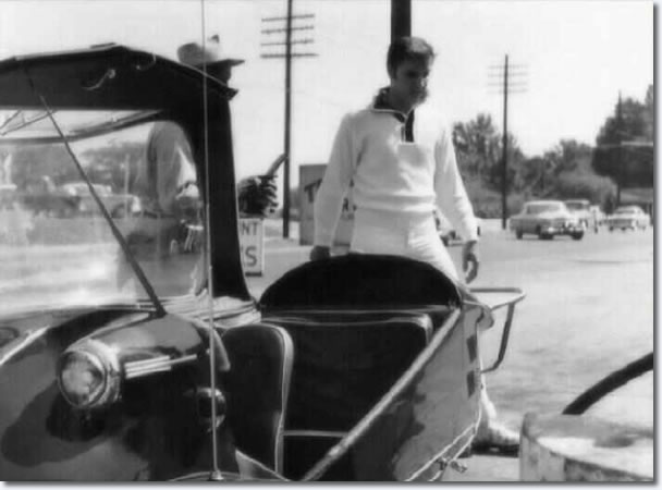 Elvis with his three-wheel custom-built Messerschmitt - Refueling