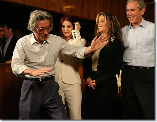 The former Japanese Prime Minister Junichiro Koizumi wore a pair of Elvis Presley's sunglasses which were given to him as a gift. Koizumi is a huge Elvis buff and he even got to do his Elvis impersonation for Priscilla, Lisa Marie, second from right, and President Bush, right, as he and Bush toured the late singer's home in Memphis, Tenn. in 2006. The Bush-Koizumi tour through the Memphis mansion wrapped up two days of consultations between the staunch allies.