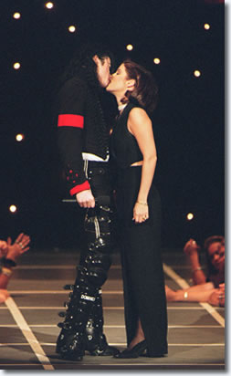 Lisa Marie goes from being daughter of a "King," to marrying the "King of Pop." Lisa Marie married Michael Jackson in 1994 in the Dominican Republic in a ceremony not even her mother knew about. Here the two go in for a stage smooch the 1994 MTV Video Music Awards at Radio City Music Hall in New York. Diane Sawyer once asked Lisa Marie if the couple had sex, as their relationship burgeoned as Jackson was facing civil charges of sexually abusing a 13-year-old boy. Lisa Marie responded with an enthusiastic, "Yes, yes, yes." The two divorced after 21 months on grounds of irreconcilable differences. Lisa Marie's lawyer stated the marriage was "a mistake, everyone knows." 